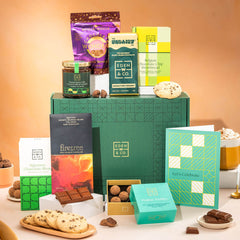 Raise a toast with this celebration Vegan & Gluten Free Chocolate Hamper, crafted to match the joy of the occasion.