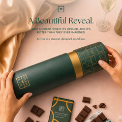 Unboxing: EDEN & CO. gift tube being opened by hand, headline “A Beautiful Reveal” with text “That moment when it’s opened, and it’s better than they ever imagined. Arrives in a discreet, designed postal box,” styled with gold silk, champagne and chocolate pieces.