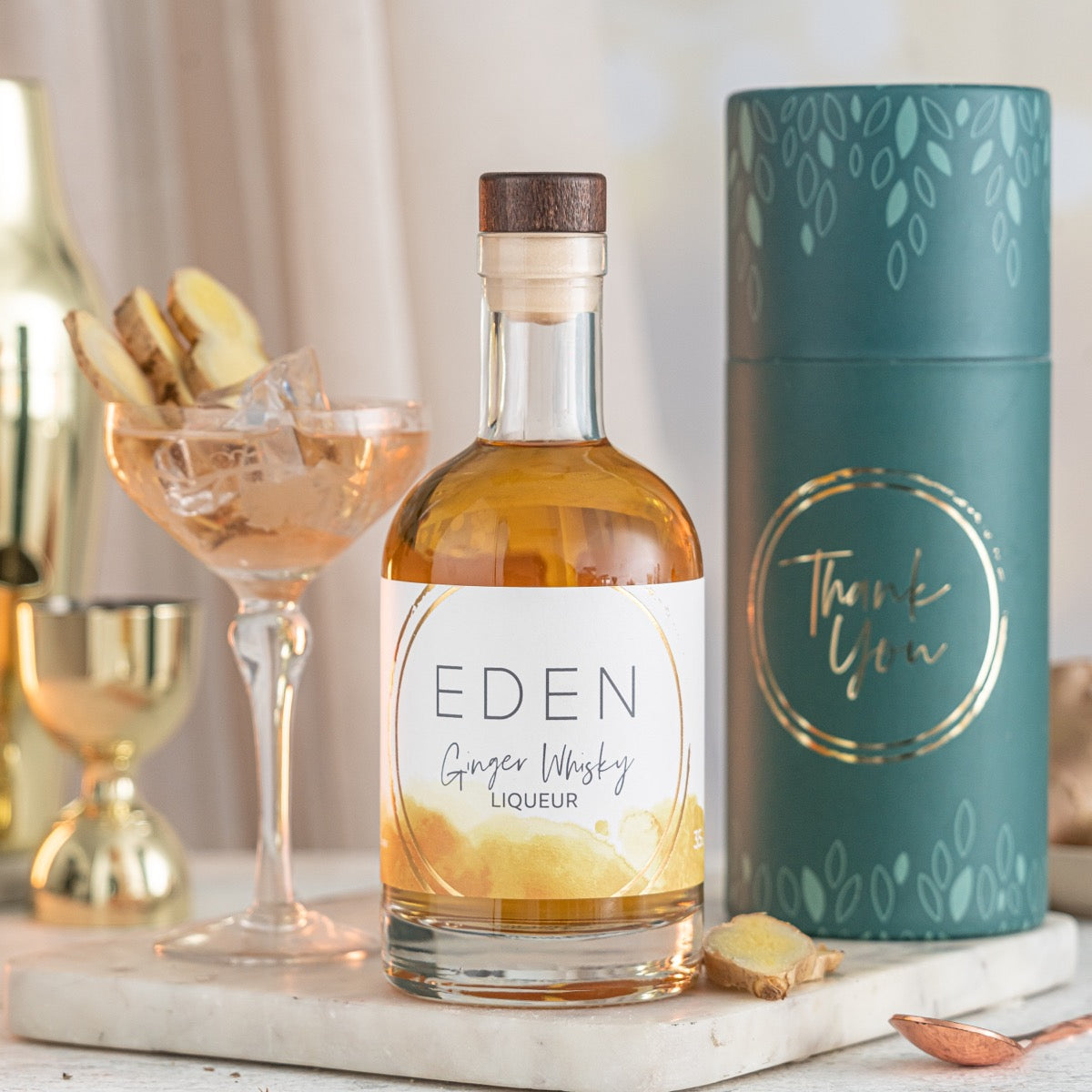 Warm their senses with this Ginger Whisky liqueur gift set, a rich, spiced spirit delivered in a refined gift box.