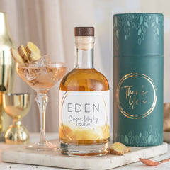 Warm their senses with this Ginger Whisky liqueur gift set, a rich, spiced spirit delivered in a refined gift box.